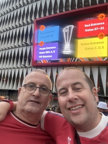 Dean and his dad Cooky on an away day at the match